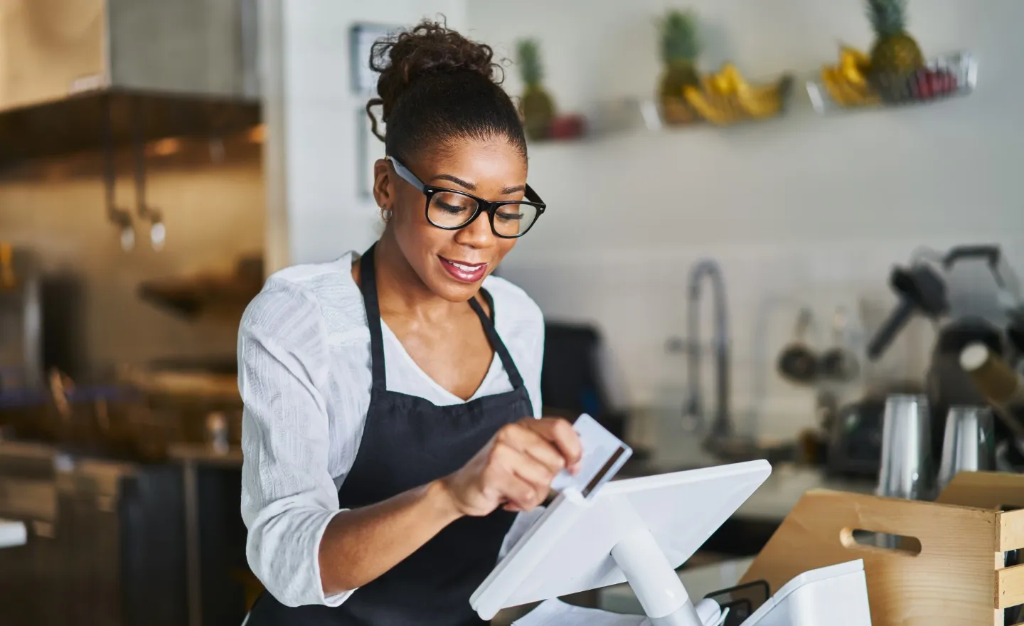 Small business owner at checkout