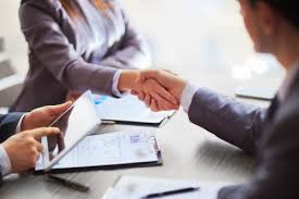 Business handshake meeting